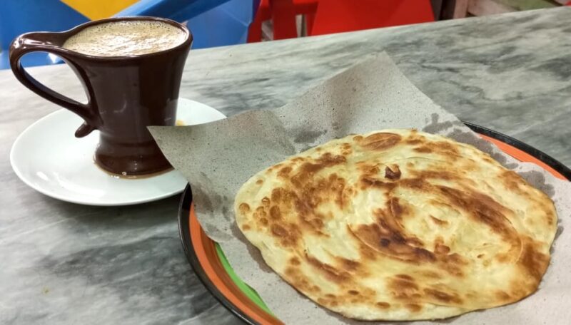 Tea and paratha - a refreshing breakfast. Image by the author.