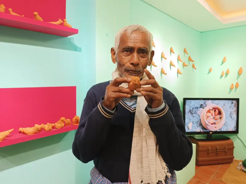 a man playing pilru