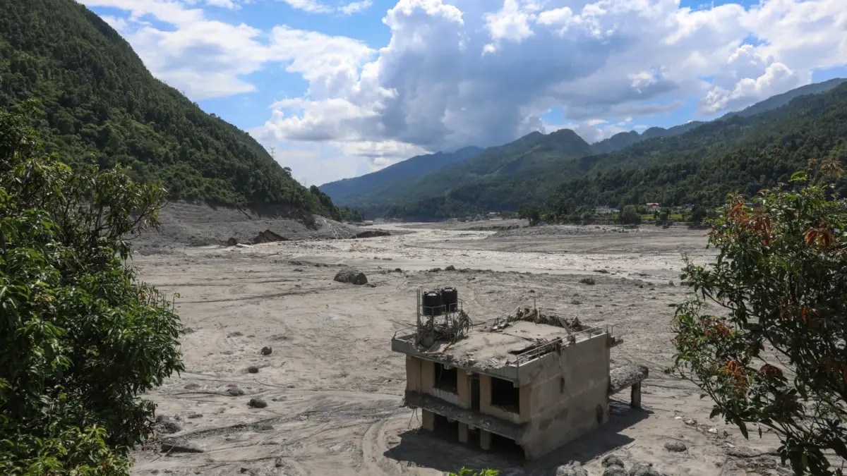 A lone house standing amid the mud. Photo by Suman Nepali of Nepali Times. Used with permission.
