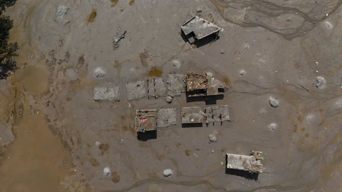 Buildings engulfed in mud, Nepal. Photo by Suman Nepali of Nepali Times. Used with permission.